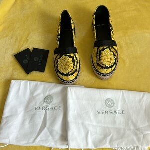 Authentic Versace espadrilles worn once.  Excellent condition size 37 1/2.